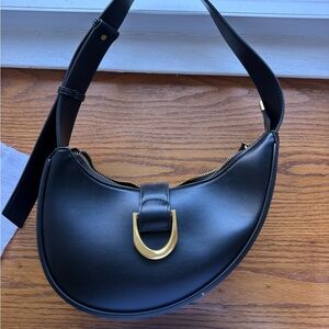 Chic Black Leather Shoulder Bag with Gold Accent